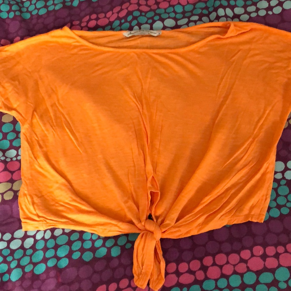 Bright orange tie front crop top